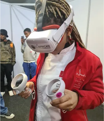 young lady testing AT VR headset 
